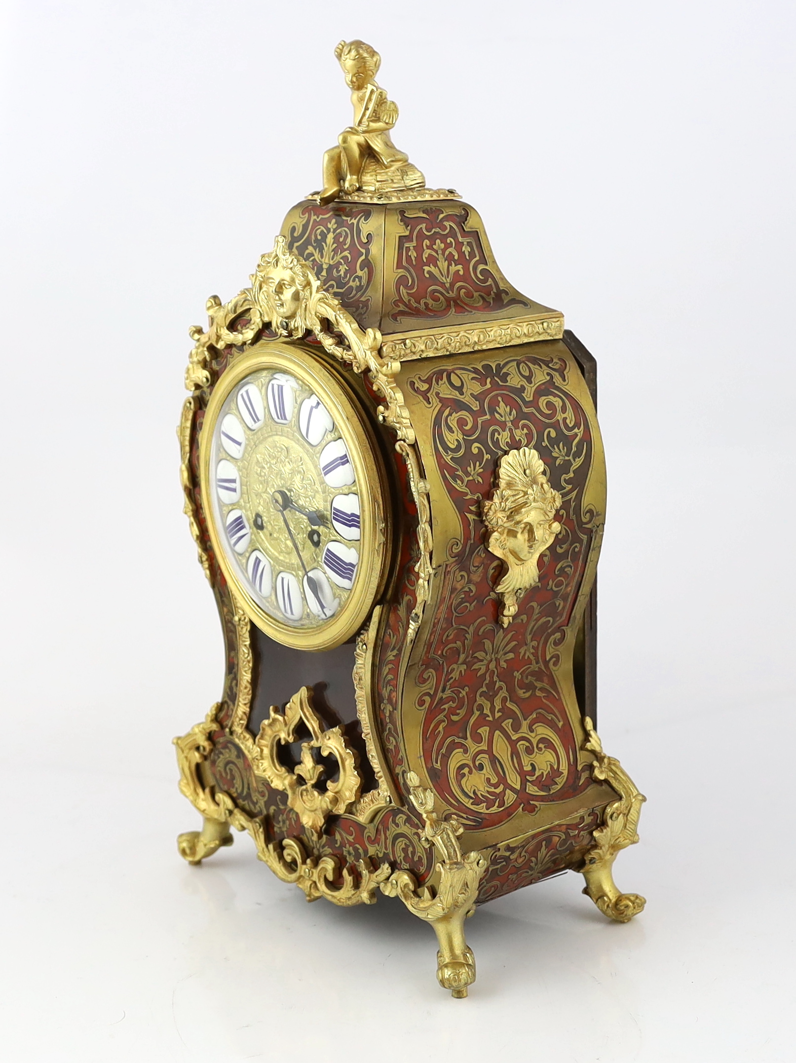 An early 20th century French ormolu mounted red boulle work mantel clock, 43cm high